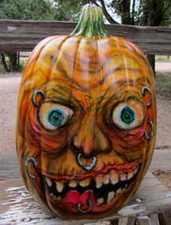 Pumpkin with piercings and rings